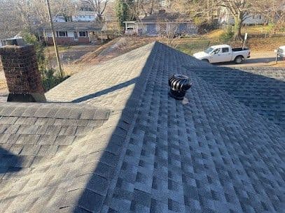 A gray asphalt shingle roof.